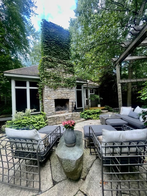 Gated outdoor oasis with fireplace ready for your s'mores!
