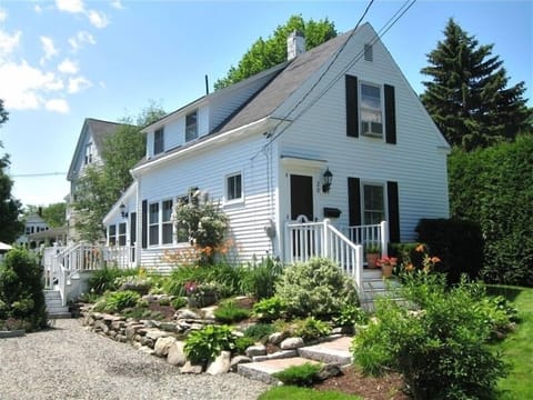 Front view of Cottage with terraced garden