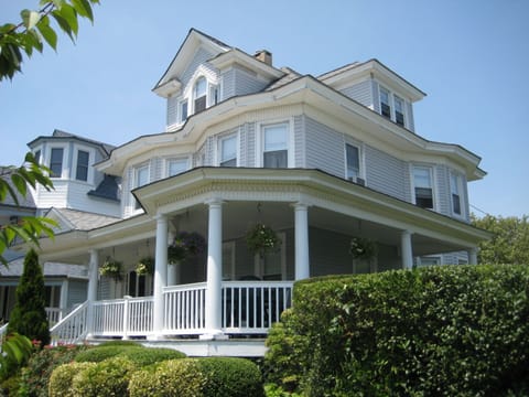 Classic shore house with wrap-around porch. 1/2 a block from the beach.