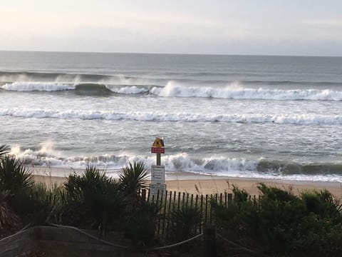 View from the deck by the dining area -Beautiful crashing waves along the beach