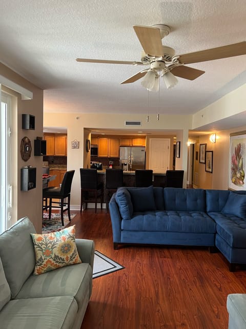 Open floor plan connecting living room, dining room, kitchen, and balcony!