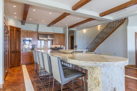 The kitchen offers a large seating area with a granite countertop! Its a huge Wow factor!
