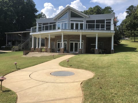Fire pit built into the sidewalk leading from the house to the dock!