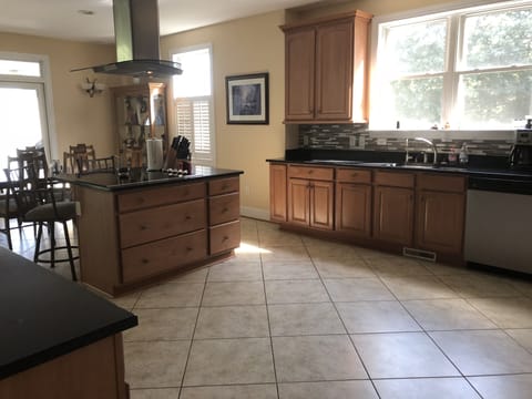 Large chief's kitchen with island, plenty of room to prepare food for everyone!