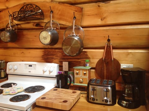 Kitchenaid cookware, toaster, kettle, coffee maker and grinder. 