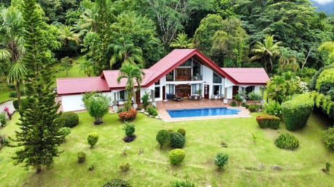 Our lovely home backed by the jungle