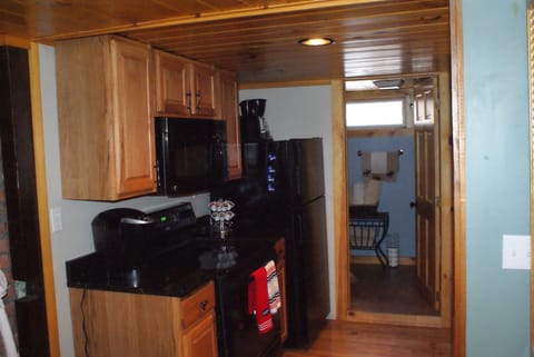 Second kitchen downstairs is added convenience.