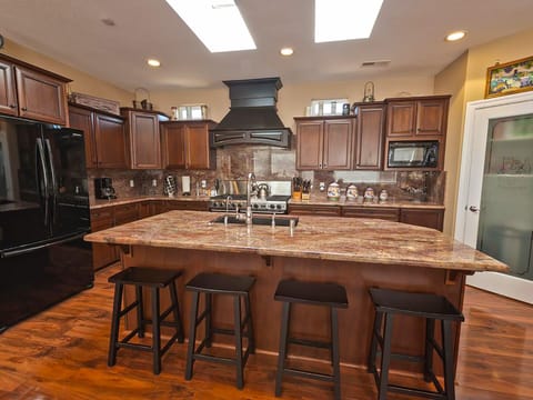Large gourmet kitchen fully stocked.  High end cookware.
