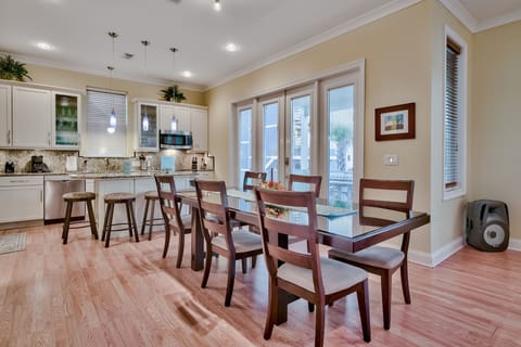 Indoor & outdoor dining areas near open kitchen area, seats up to 16.