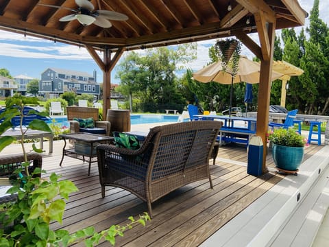 Cabana with bluetooth speakers and refrigerator