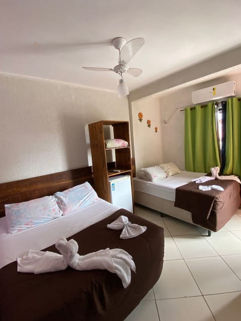 Standard Quadruple Room | Premium bedding, minibar, blackout drapes, free WiFi