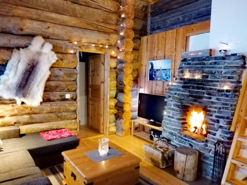 Apartment, 2 Bedrooms, Sauna | Living room | 42-inch Smart TV with digital channels, fireplace, heated floors