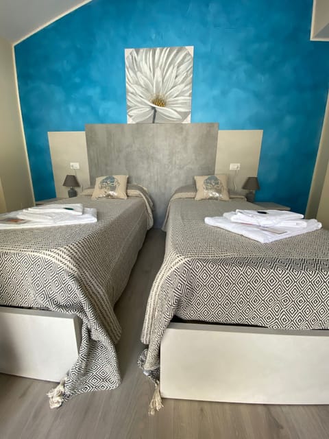 Basic Double or Twin Room, 2 Twin Beds, Non Smoking | In-room safe, soundproofing, iron/ironing board, free WiFi