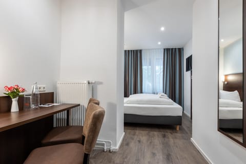 Standard Twin Room | Desk, blackout drapes, soundproofing, iron/ironing board