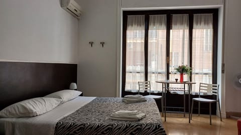 Economy Quadruple Room, 1 Bedroom, Shared Bathroom, Courtyard View | Individually furnished, iron/ironing board, free WiFi, bed sheets