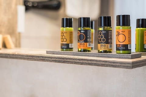 Shower, rainfall showerhead, designer toiletries, hair dryer