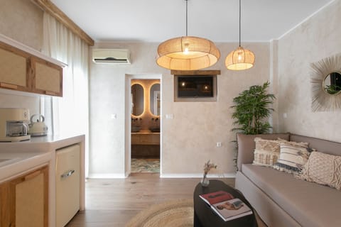 King Suite Balcony | Living area | Flat-screen TV