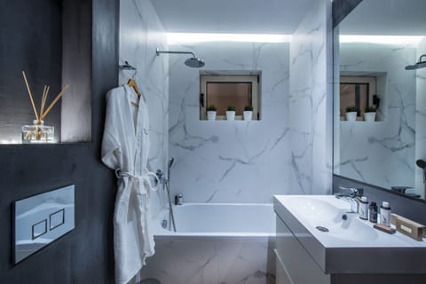 Shower, free toiletries, hair dryer, bathrobes