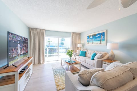Cozy and inviting living area with stylish coastal decor and natural light