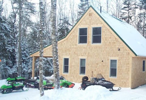 Snowmobile from trail to cabin!
