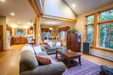 An open floor plan with living room, dining area and kitchen make family gatherings a breeze.