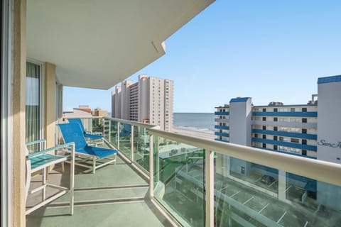 Layout on your balcony while watching the waves crash onto shore.