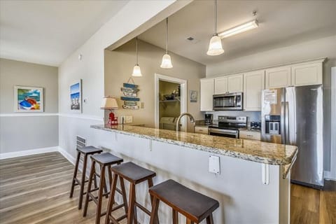 Grab a snack at the kitchen bar before heading back to the beach.