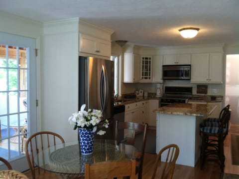 Kitchen with updated appliances and granite counters