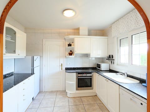 Property, Room, Kitchen, Cabinetry, Furniture, Countertop, Building, Interior Design, House, Ceiling