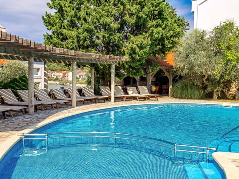 Water, Plant, Sky, Swimming Pool, Azure, Building, Tree, Outdoor Furniture, Leisure, Real Estate