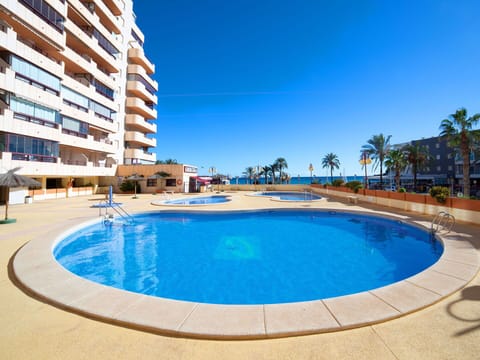 Water, Sky, Plant, Daytime, Building, Azure, Flower, Tree, Swimming Pool, Seaside Resort