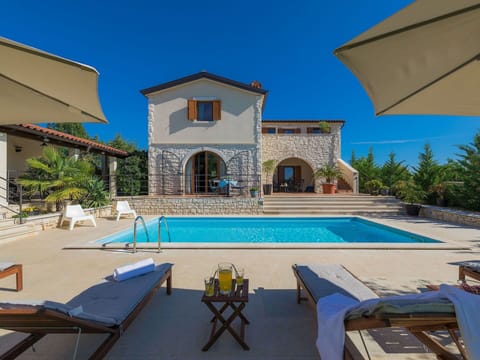 Sky, Building, Plant, Property, Swimming Pool, Azure, Shade, Outdoor Furniture, Architecture, House