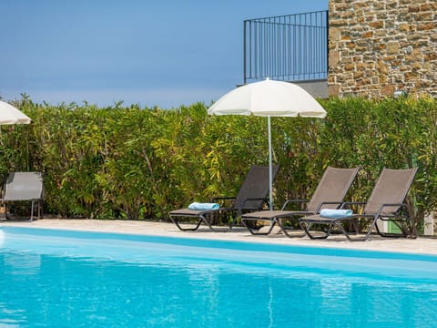 Water, Plant, Furniture, Property, Umbrella, Azure, Shade, Swimming Pool, Outdoor Furniture, Sunlounger