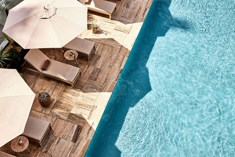 Outdoor pool, open 8:00 AM to 10:00 PM, cabanas (surcharge)