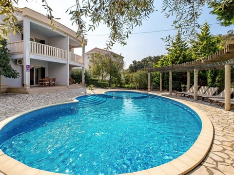 Water, Building, Daytime, Property, Swimming Pool, Plant, Sky, Azure, Nature, Blue