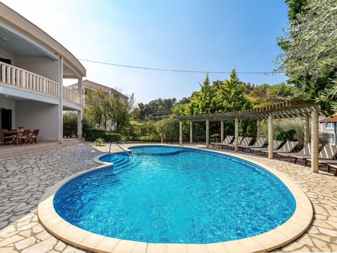 Water, Property, Sky, Plant, Swimming Pool, Azure, Blue, Tree, Body Of Water, Urban Design