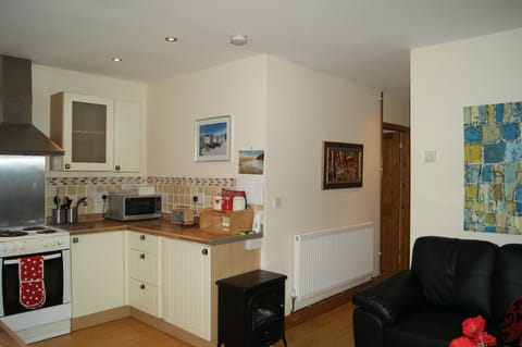 Open plan kitchen and seating area.