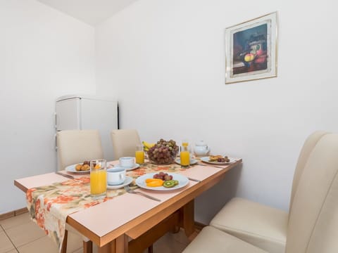 Room, Furniture, Property, Table, Interior Design, Yellow, Dining Room, Wall, House, Building