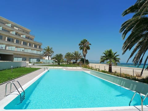 Water, Sky, Plant, Property, Swimming Pool, Building, Azure, Tree, Shade, Architecture