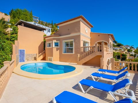 Building, Property, Sky, Blue, Azure, Shade, Swimming Pool, Tree, Outdoor Furniture, Leisure