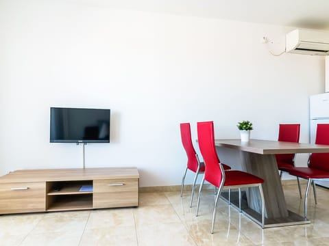 Furniture, Room, Interior Design, Living Room, Coffee Table, Table, Property, Red, Floor, Wall