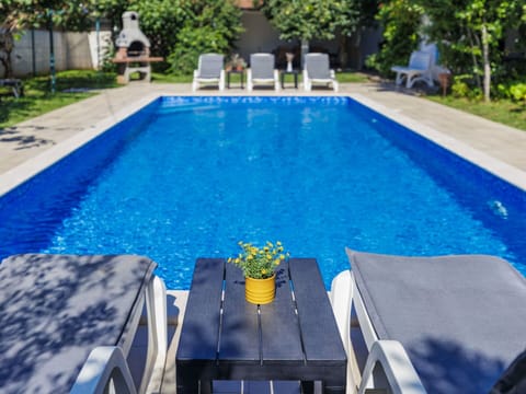 Water, Plant, Property, Swimming Pool, Azure, Rectangle, Shade, Table, Outdoor Furniture, Leisure