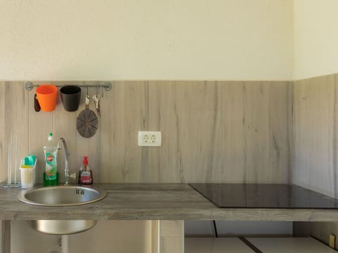 Cabinetry, Building, Furniture, Countertop, Shelf, Table, Wood, Tap, Bottle, Interior Design