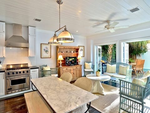 Kitchen & living area opening out to the pool