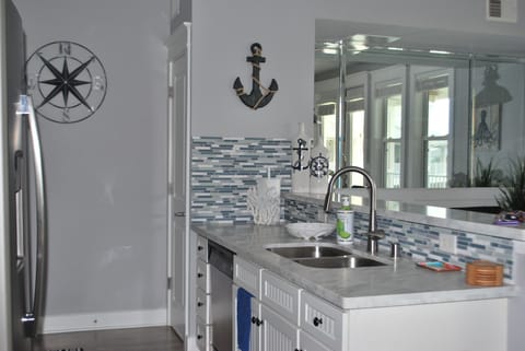 Kitchen has a pantry, full size appliances and all the comforts of home.