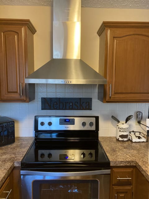 Kitchen Area (Main level) - stove area with new stainless hood/vent