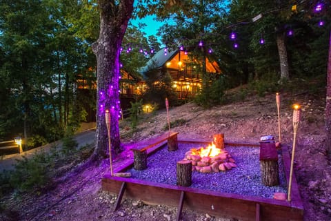 Amazing mountain top outdoor firepit with colorful lighting