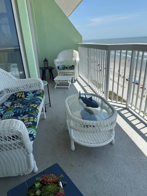Feel the ocean breeze while relaxing on the spacious balcony