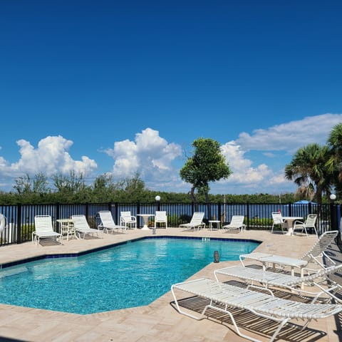 Heated Pool and pool deck overlooking Lemon Bay. Newly renovated in 2023! 