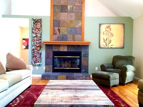 Welcome to our Lodge, high in the trees in the woods, but impossibly close in